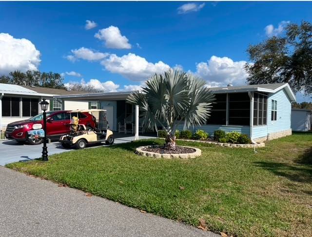 Winter Haven, FL Mobile Home for Sale located at 2218 Tamarron Lane Four Lakes Golf & Country Club